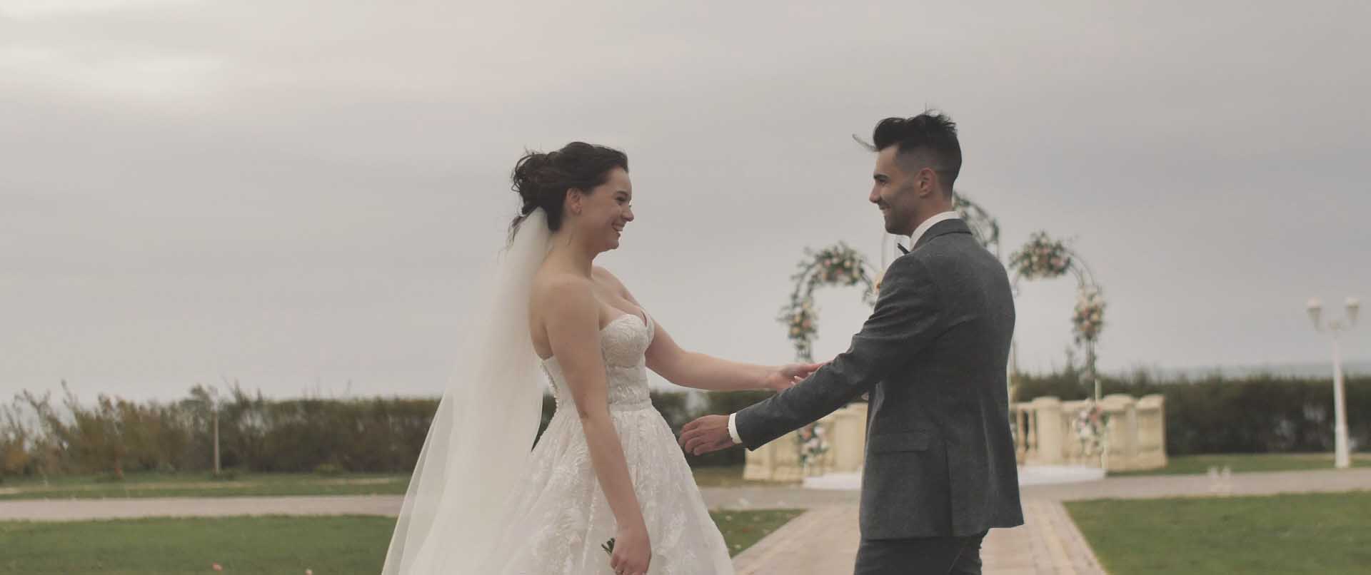 Bride and groom holding hands at their ceremony